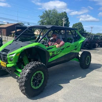Customer with a new Kawasaki Teryx KRX4 at Right Wheels in Derby, VT